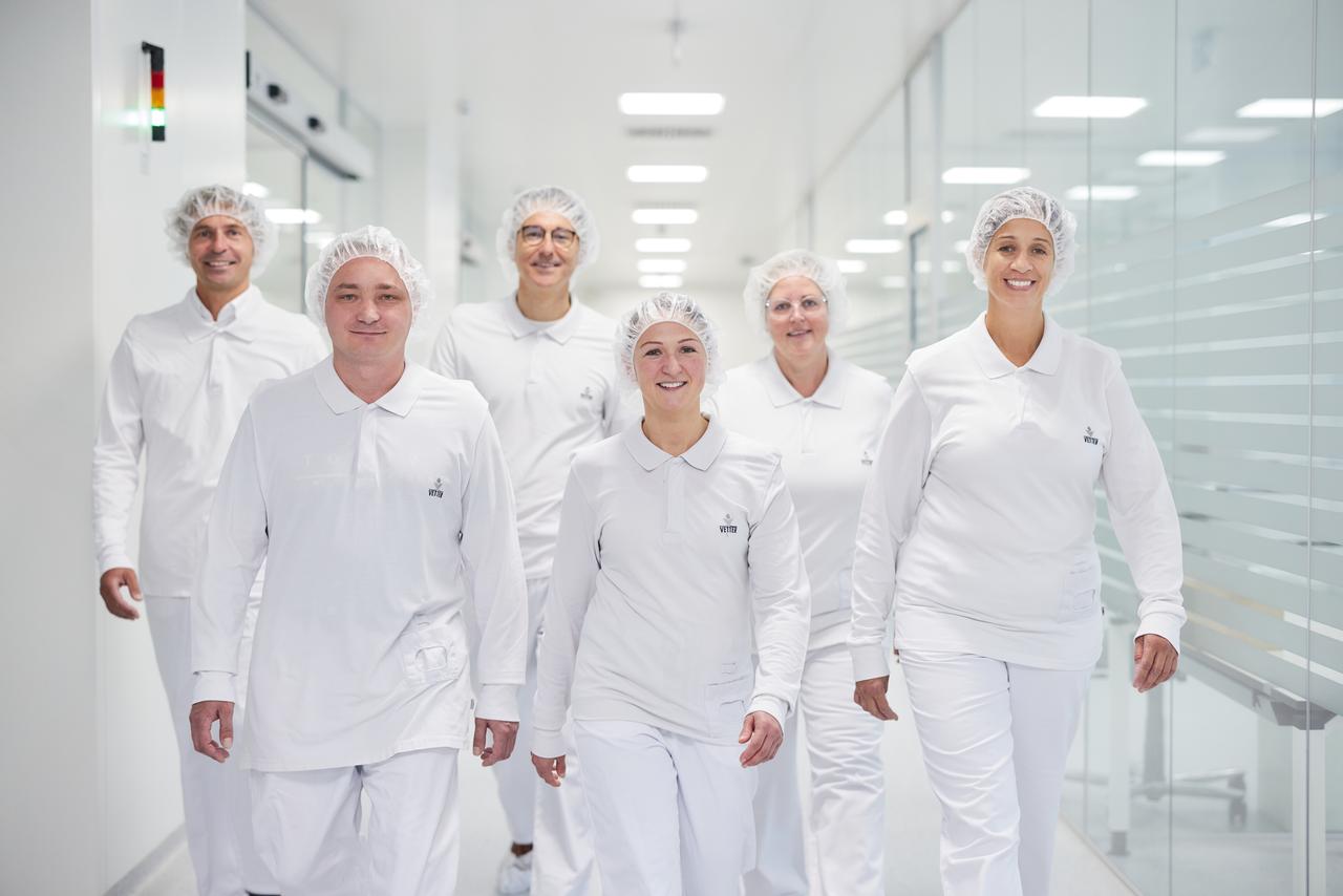 Pharmaceutical production employees from a CDMO