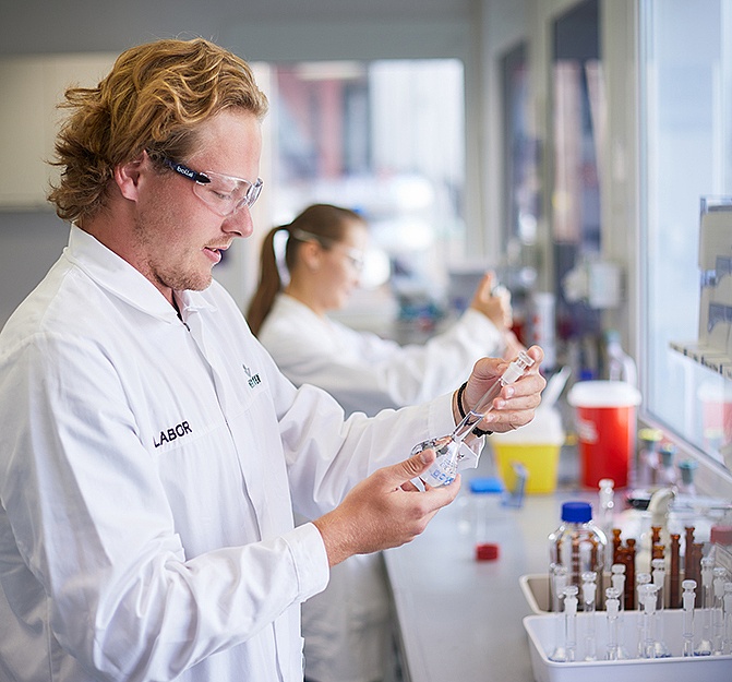 lab worker doing material testing